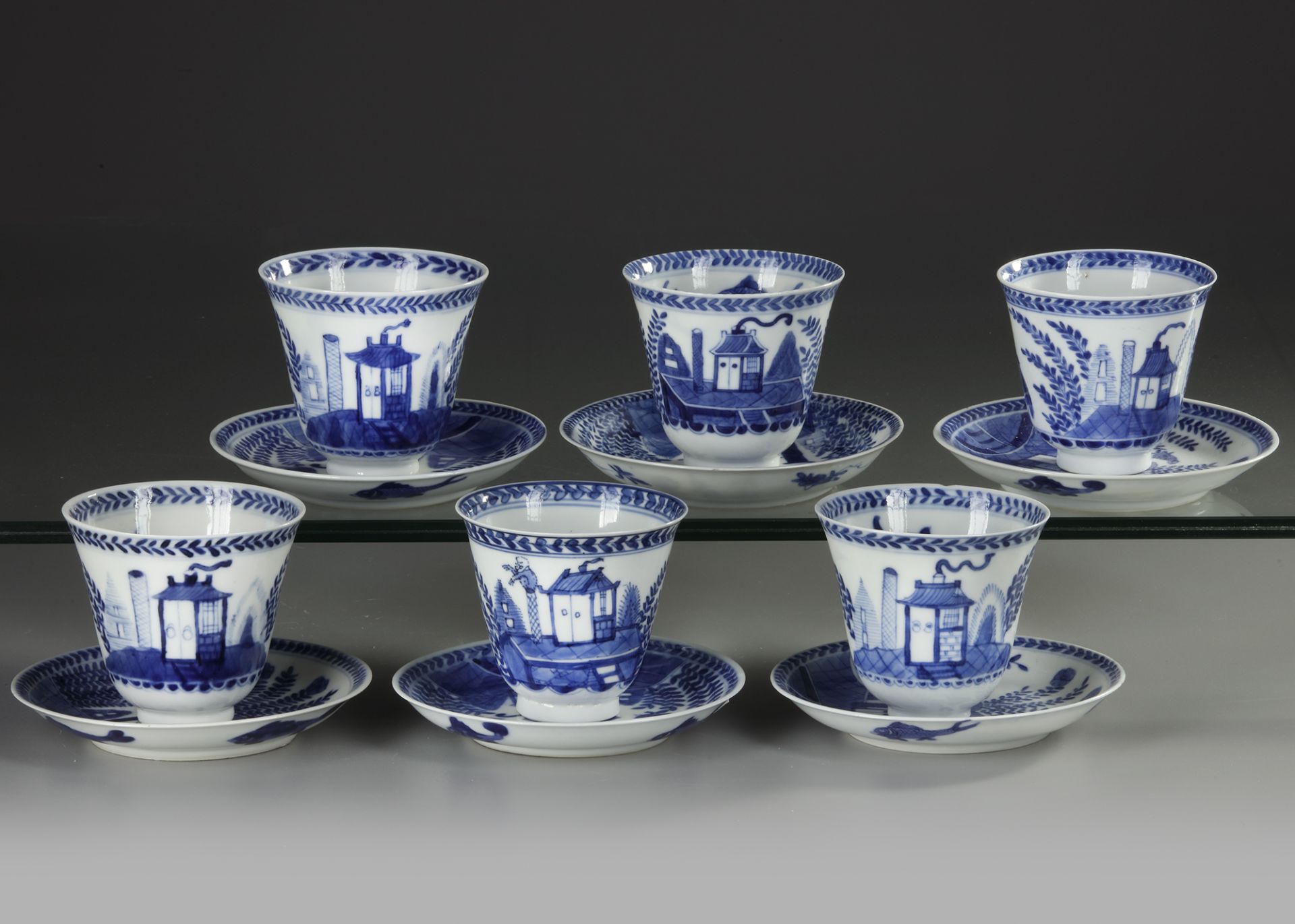 SIX CHINESE BLUE AND WHITE 'CUCKOO IN THE HOUSE' CUPS AND SAUCERS, 18TH CENTURY