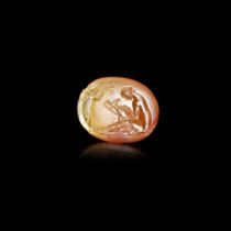 A CHARMING ROMAN INTAGLIO OF A DRUNKEN MAENAD(?), 2ND-3RD CENTURY AD