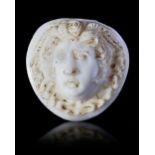 A LARGE WHITE ROMAN AGATE CAMEO WITH THE HEAD OF MEDUSA, 2ND-3RD CENTURY AD