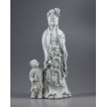 AN EXCEPTIONAL LARGE DEHUA GLAZED FIGURE OF A GUANYIN WITH A CHILD, 20TH CENTURY