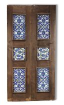 A WOODEN DOOR SET WITH 10 DAMASCUS STYLE POTTERY TILES, 20TH CENTURY