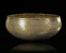 A SILVER INLAID BRASS BOWL, 14TH CENTURY