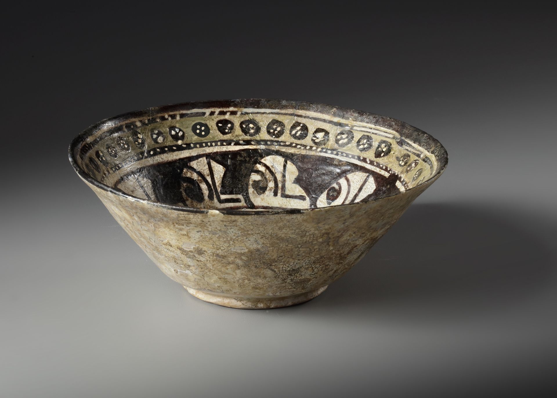 A NISHAPUR CONICAL POTTERY BOWL, PERSIA, LATE 9TH-EARLY 10TH CENTURY - Image 3 of 4