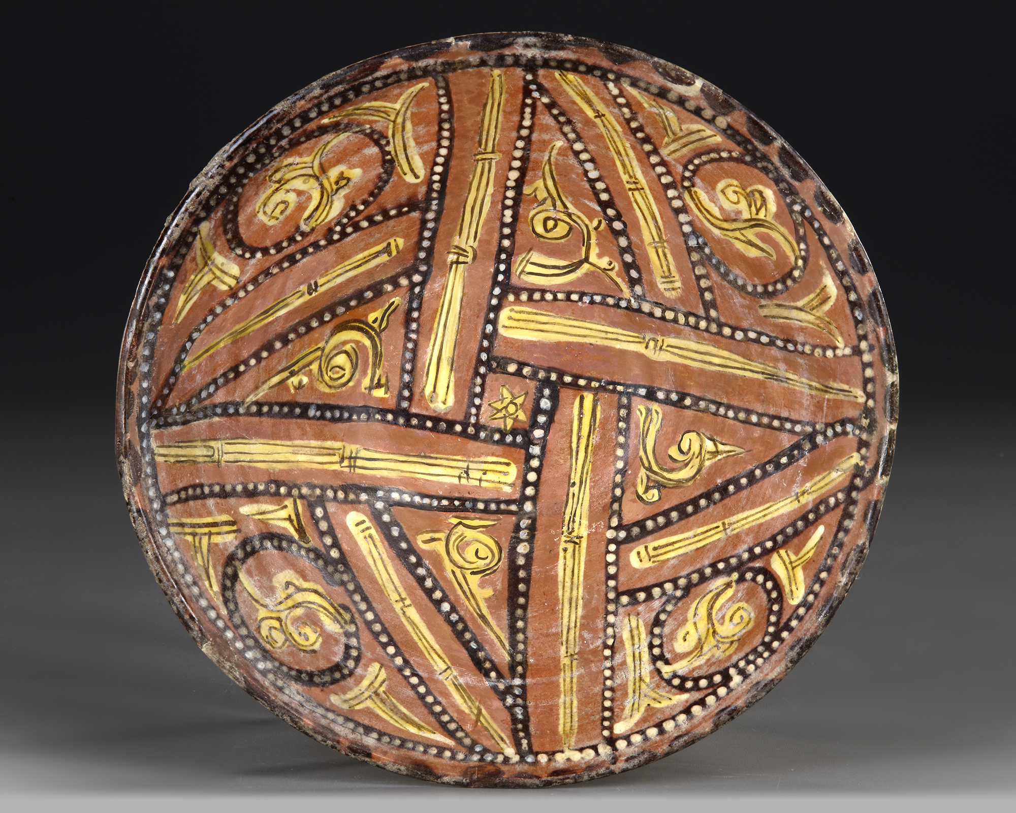 A NISHAPUR CONICAL POTTERY BOWL, PERSIA, 10TH CENTURY