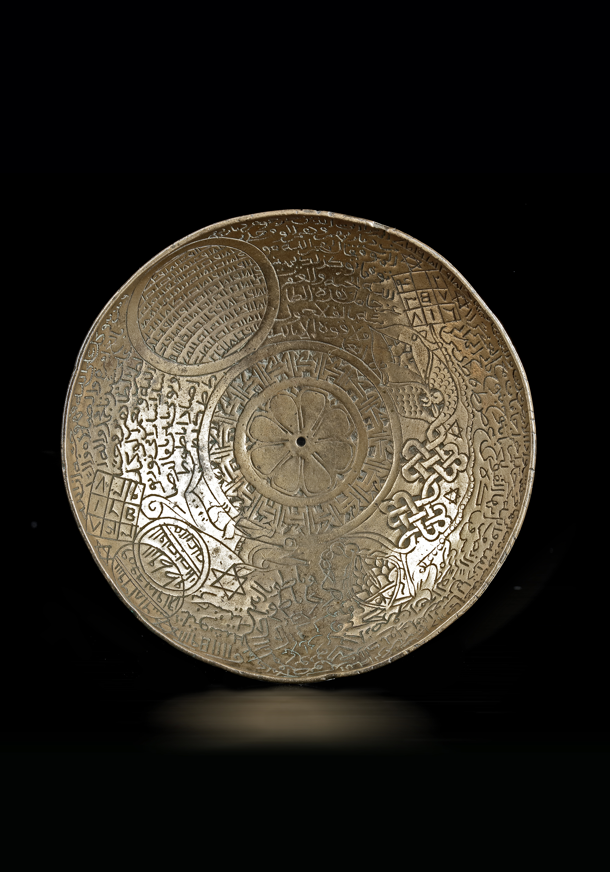 A GILT BRONZE MAGIC BOWL, 13TH-14TH CENTURY