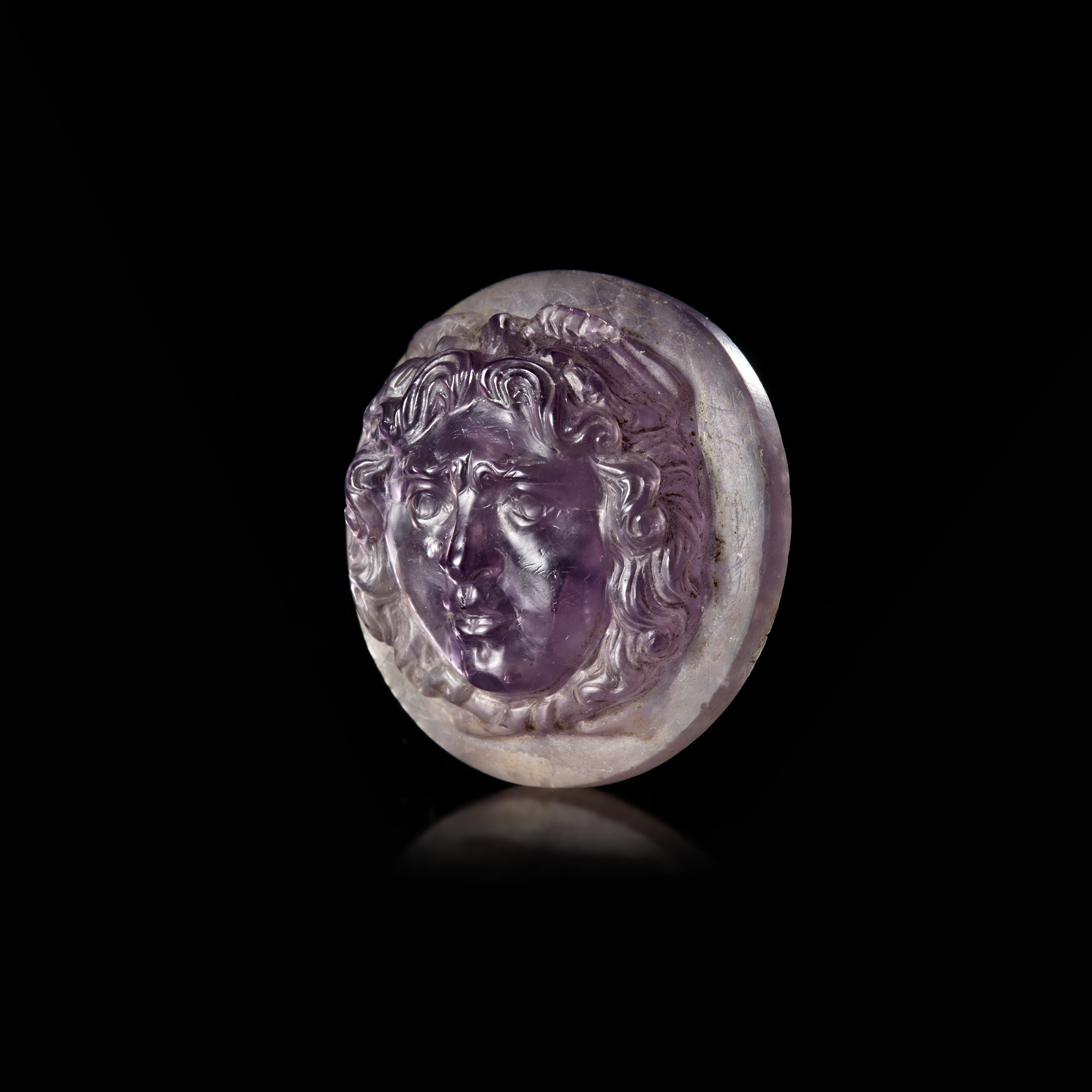 AN AMETHYST CAMEO OF MEDUSA, PROBABLY 18TH CENTURY AD