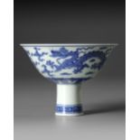 A CHINESE BLUE AND WHITE DRAGONS STEM BOWL, QING DYNASTY (1644-1911)