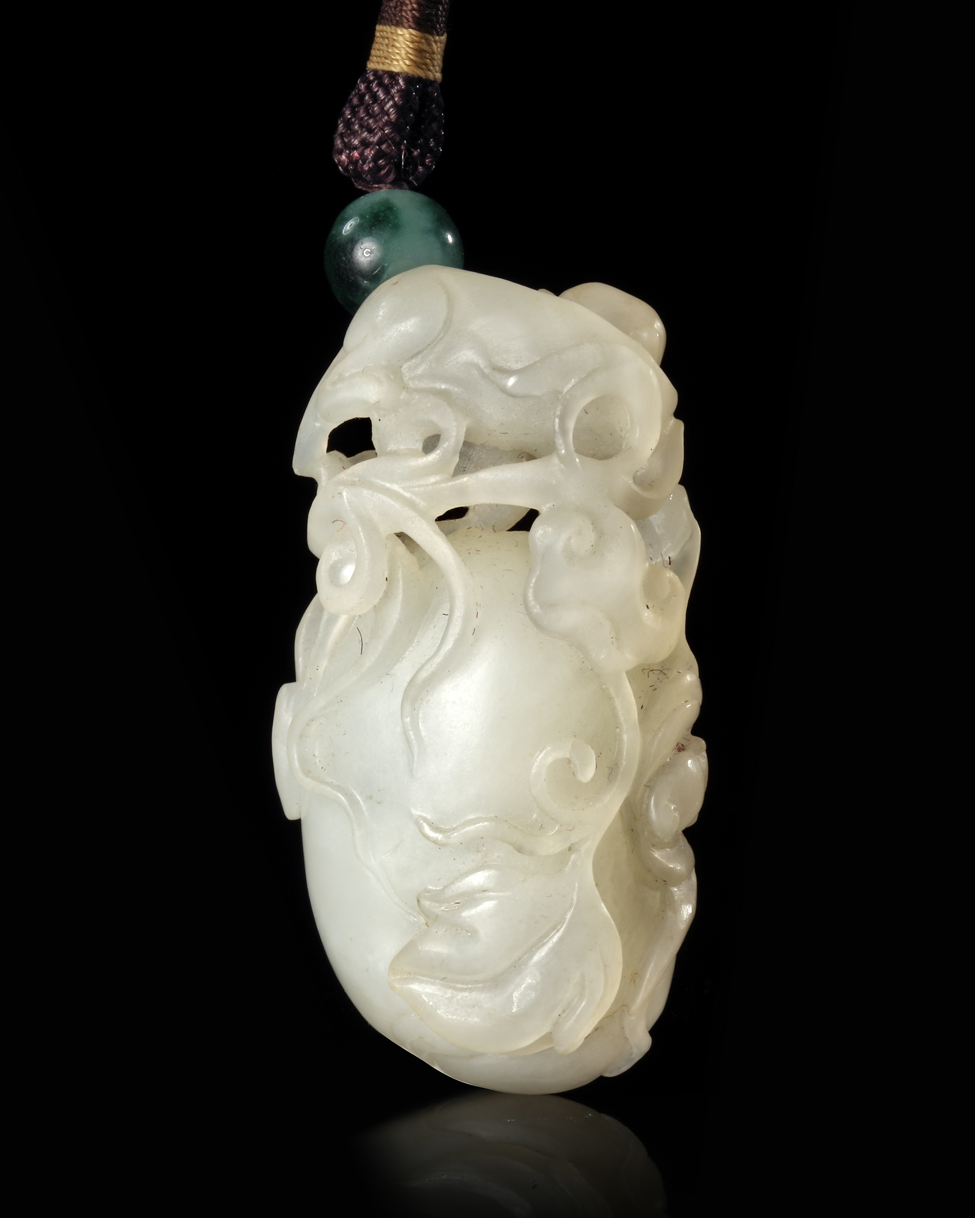 A CHINESE JADE CARVED PENDANT, 20TH CENTURY