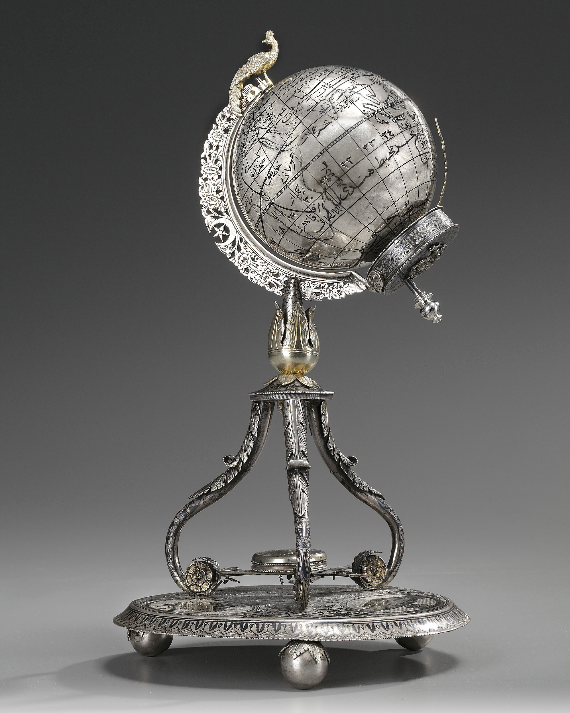 AN OTTOMAN SILVER, NIELLOED AND ENGRAVED GLOBE CLOCK BEARING THE TUGHRA OF SULTAN ABDULHAMID II TURK