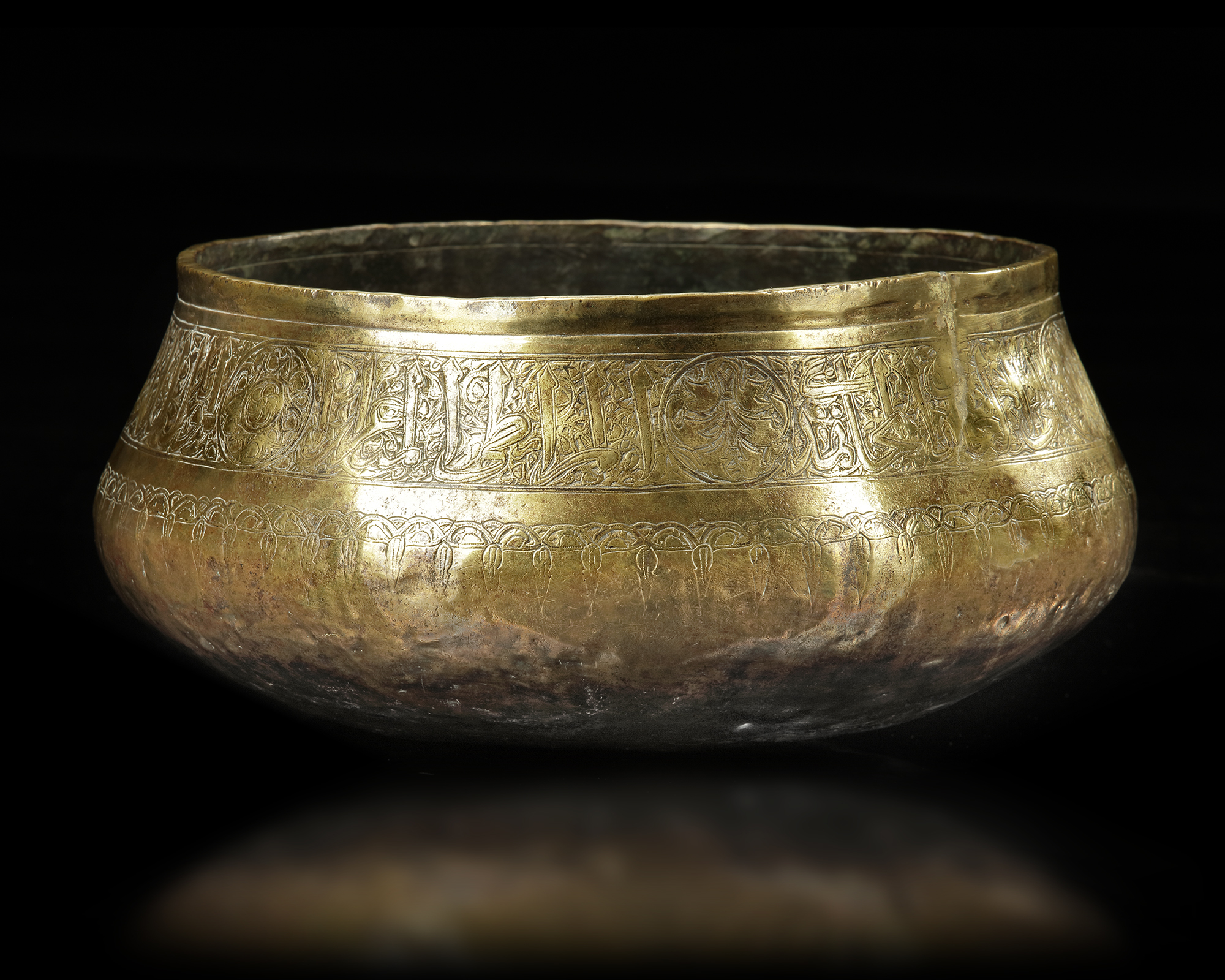 A MAMLUK BRASS BOWL WITH INSCRIPTIONS, EGYPT OR SYRIA, 14TH CENTURY