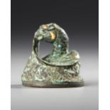 A CHINESE GOLD AND SILVER-INLAID BRONZE FIGURE OF A MYTHICAL BEAST WEIGHT, HAN DYNASTY (206 BC-AD 22