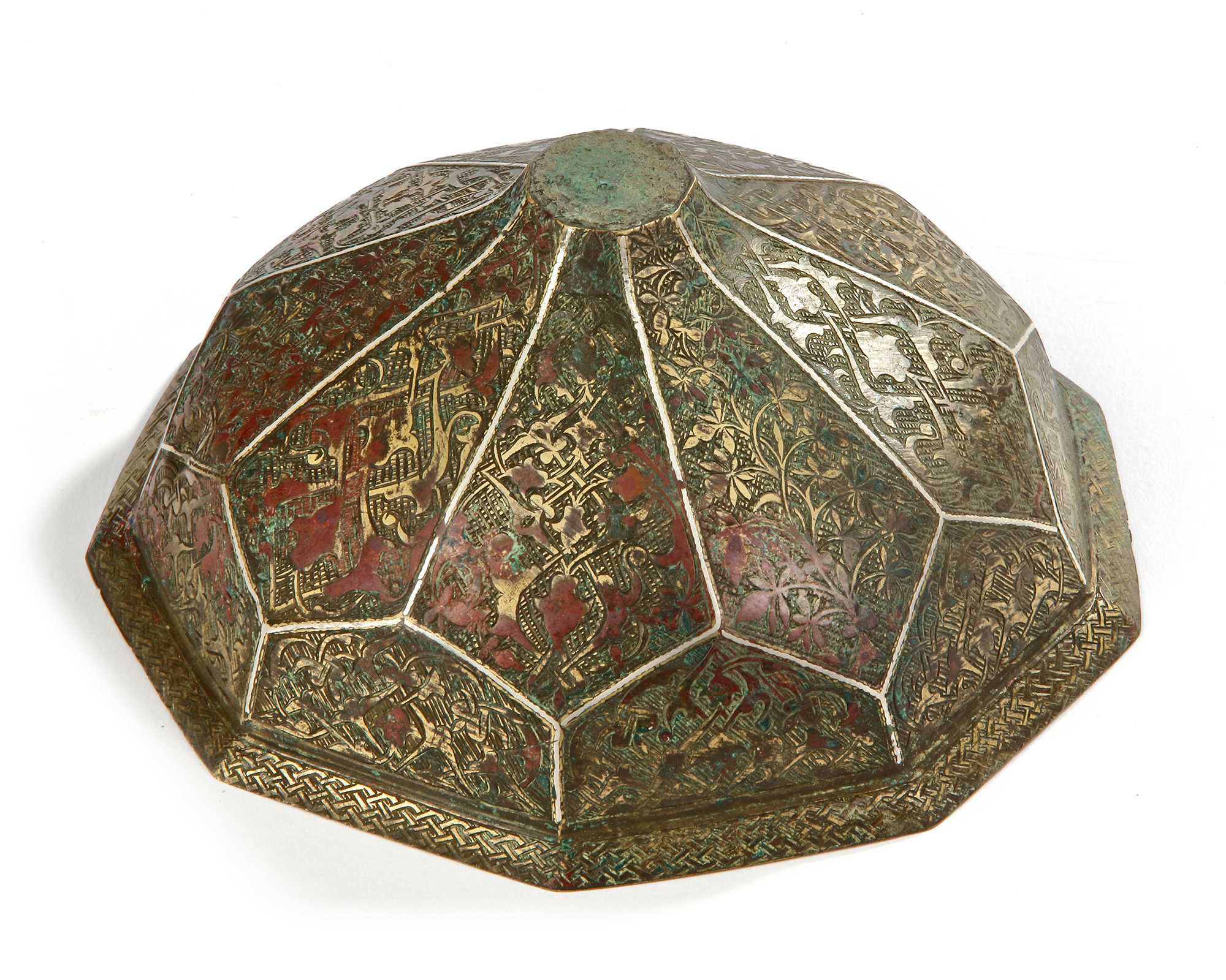 A KHORASAN SILVER-INLAID BRONZE HEXAGONAL COVER, CIRCA 1200