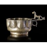 A BRONZE LOBED CUP, PERSIA, 11TH-12TH CENTURY