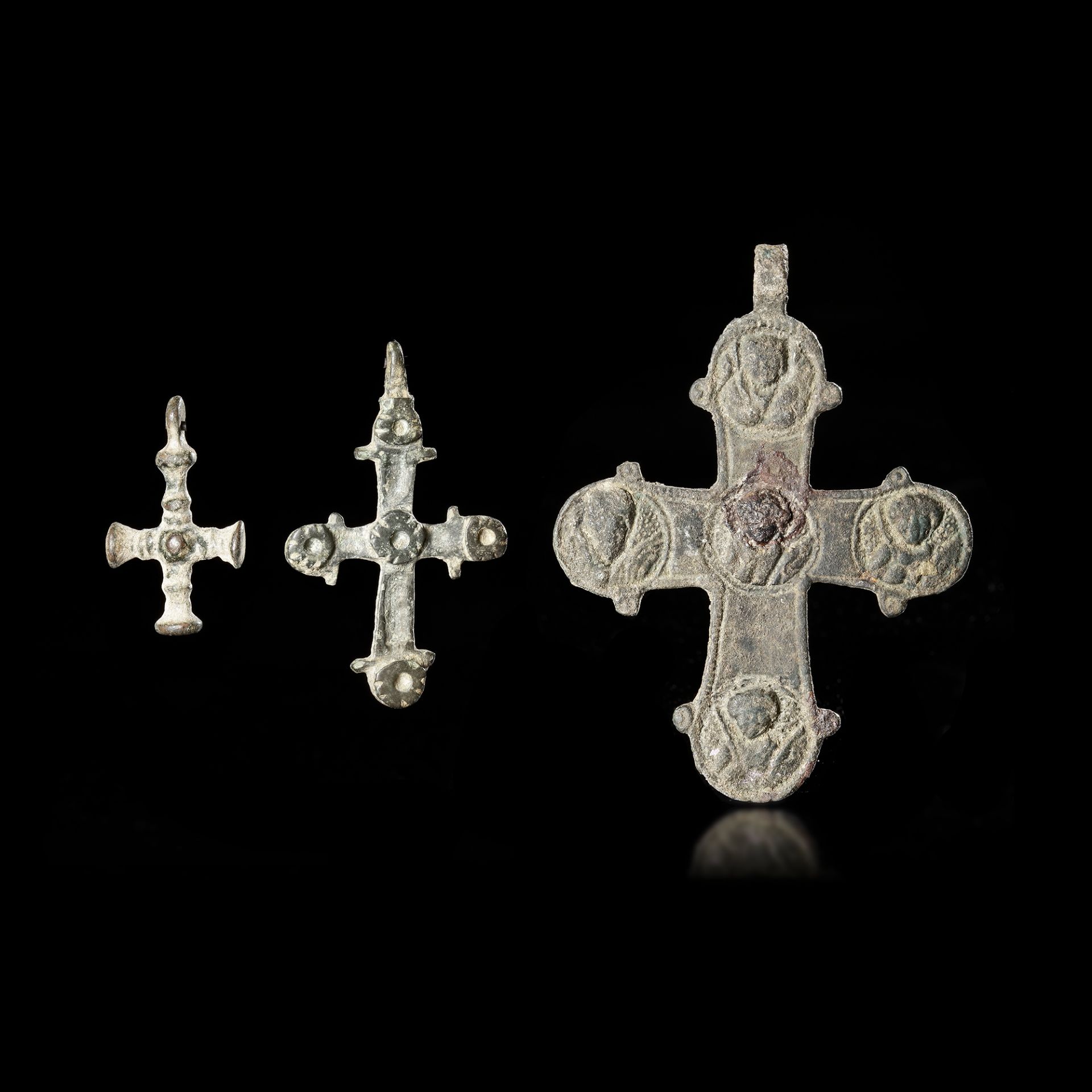 THREE BYZANTINE BRONZE PECTORAL CROSSES, 6TH-8TH CENTURY AD