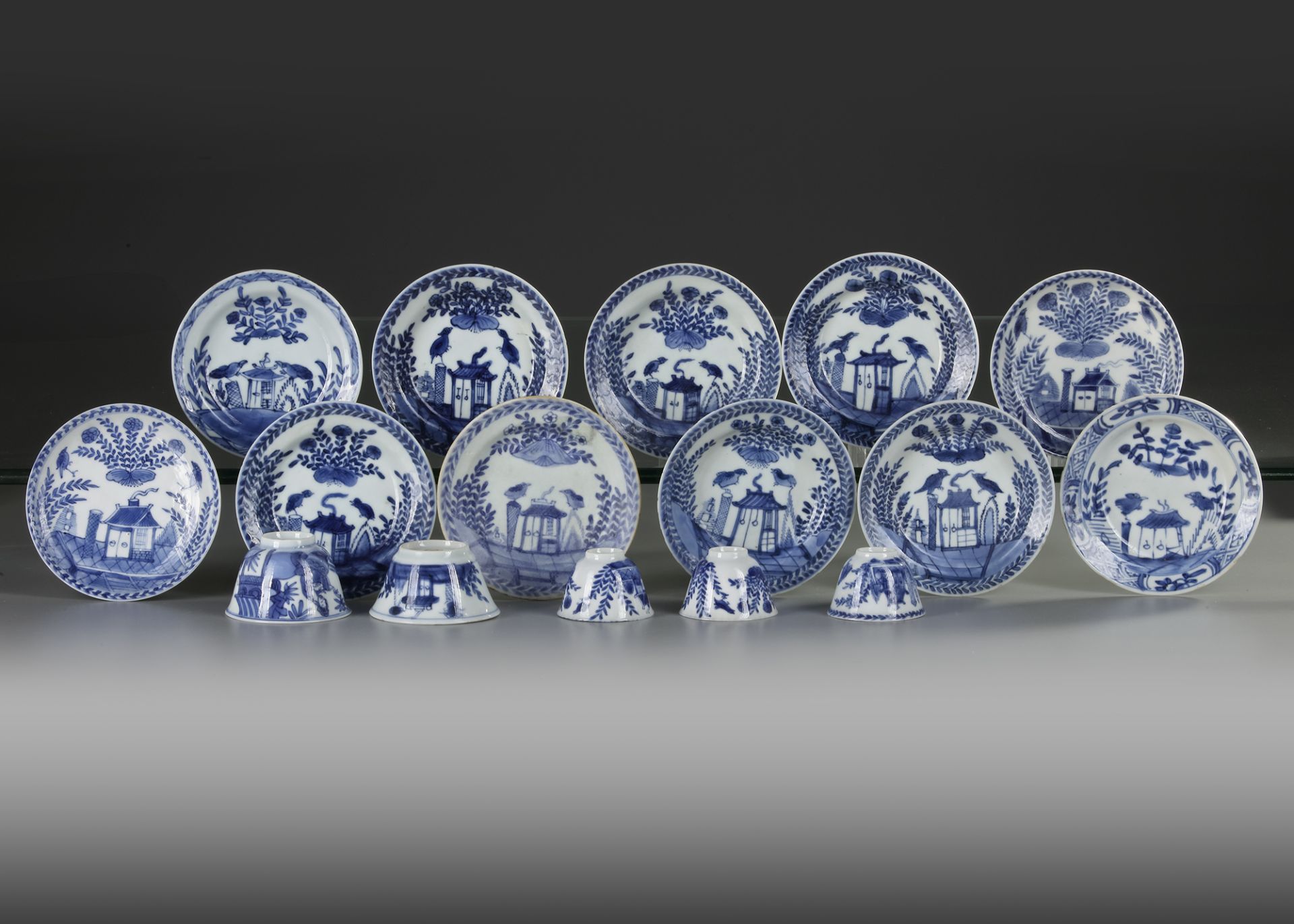A COLLECTION OF CHINESE BLUE AND WHITE FIVE CUPS AND ELEVEN SAUCERS, 18TH CENTURY - Bild 2 aus 3