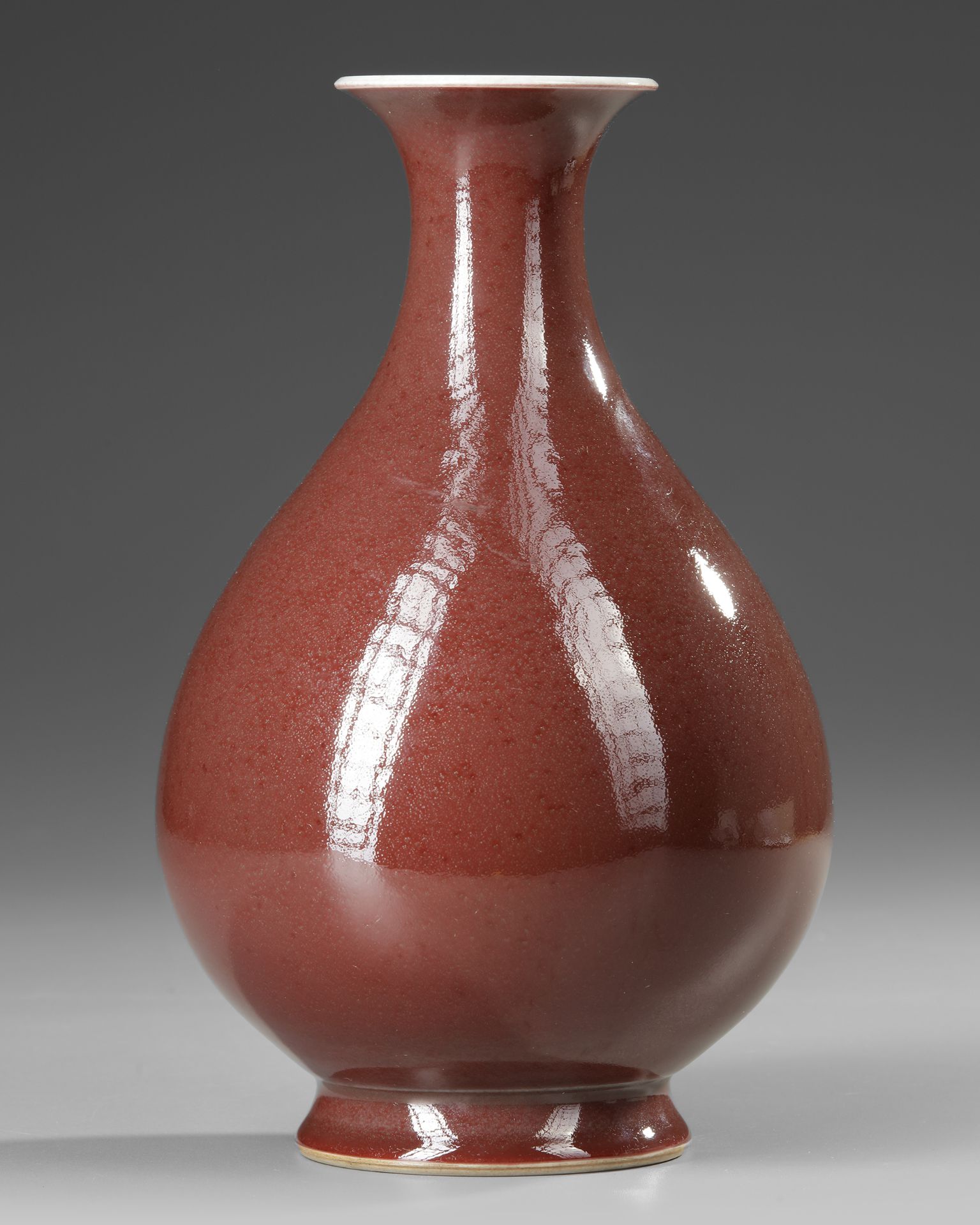 A CHINESE COPPER-RED GLAZED PEAR-SHAPED VASE, 19TH CENTURY