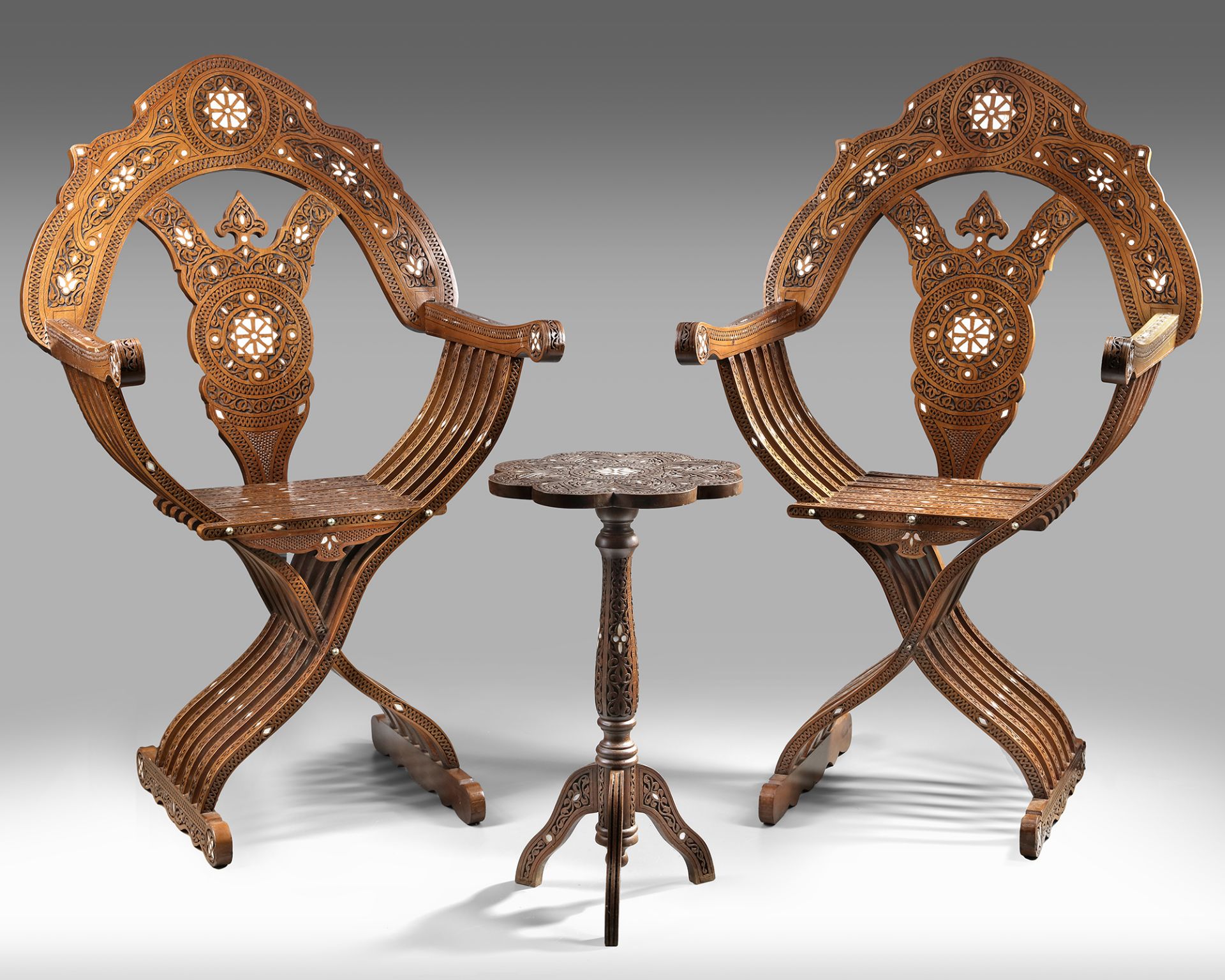 A PAIR OF SYRIAN MOTHER OF PEARL INLAID FOLDING CHAIRS AND A TABLE, LATE 19TH CENTURY