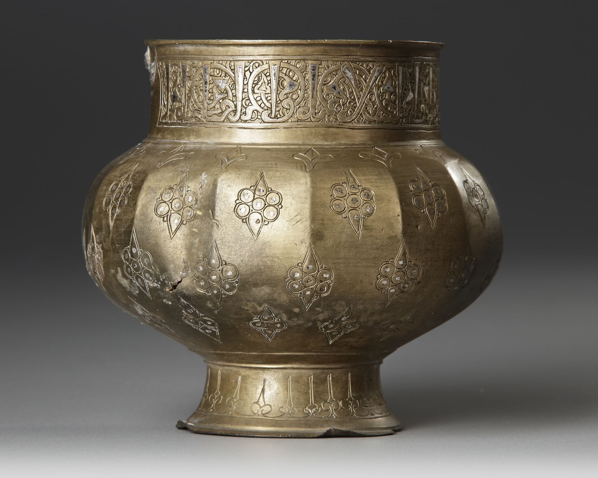 A KHURASAN BRONZE JUG WITH SILVER INLAY, CENTRAL ASIA, 12TH-13TH CENTURY