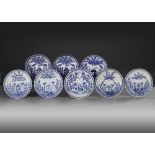 EIGHT CHINESE BLUE AND WHITE SAUCER DISHES, 18TH CENTURY