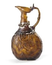 AN AMBER GLASS JUG, PERSIA, 10TH-11TH CENTURY