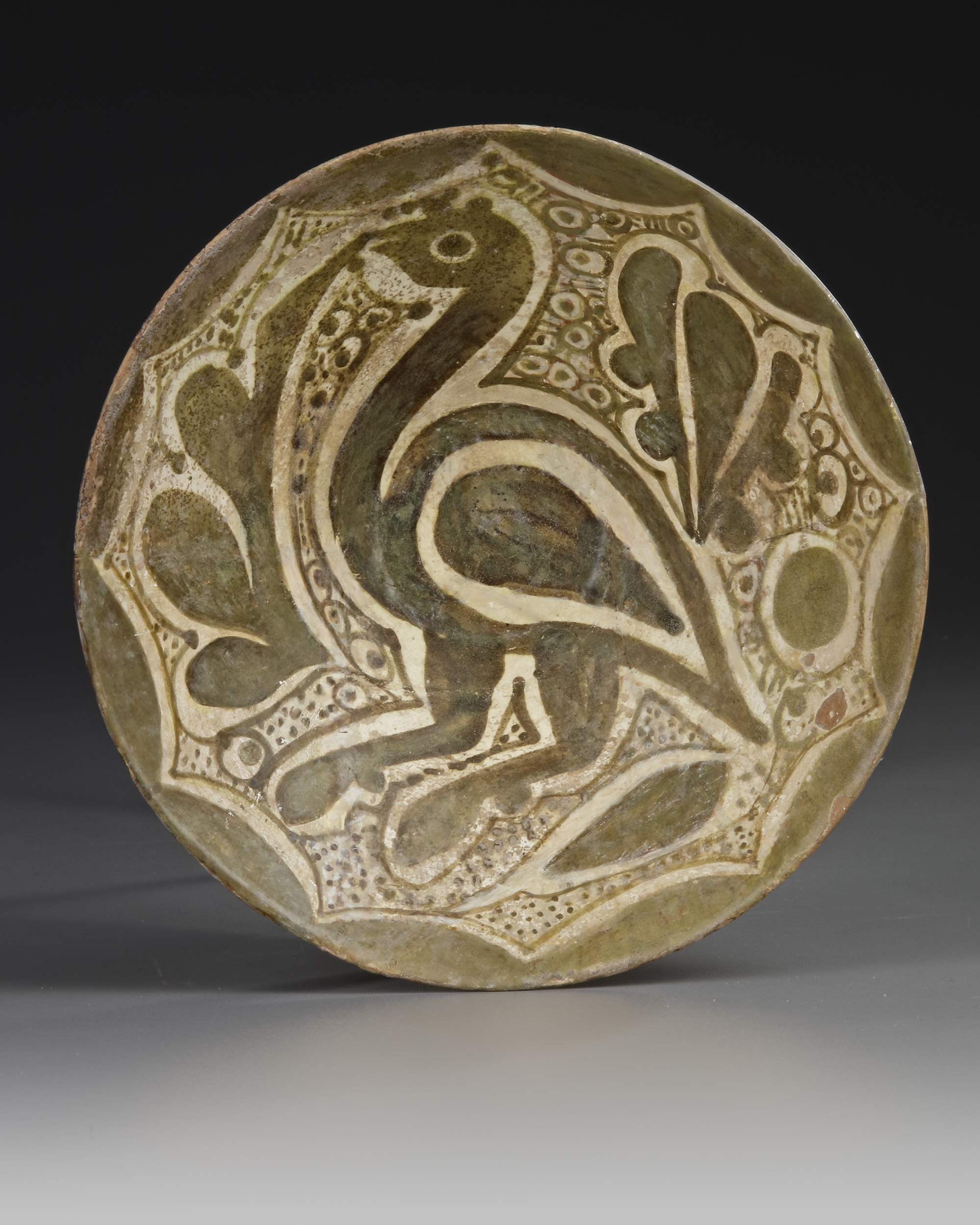 A NISHAPUR POTTERY BOWL, PERSIA, 10TH CENTURY