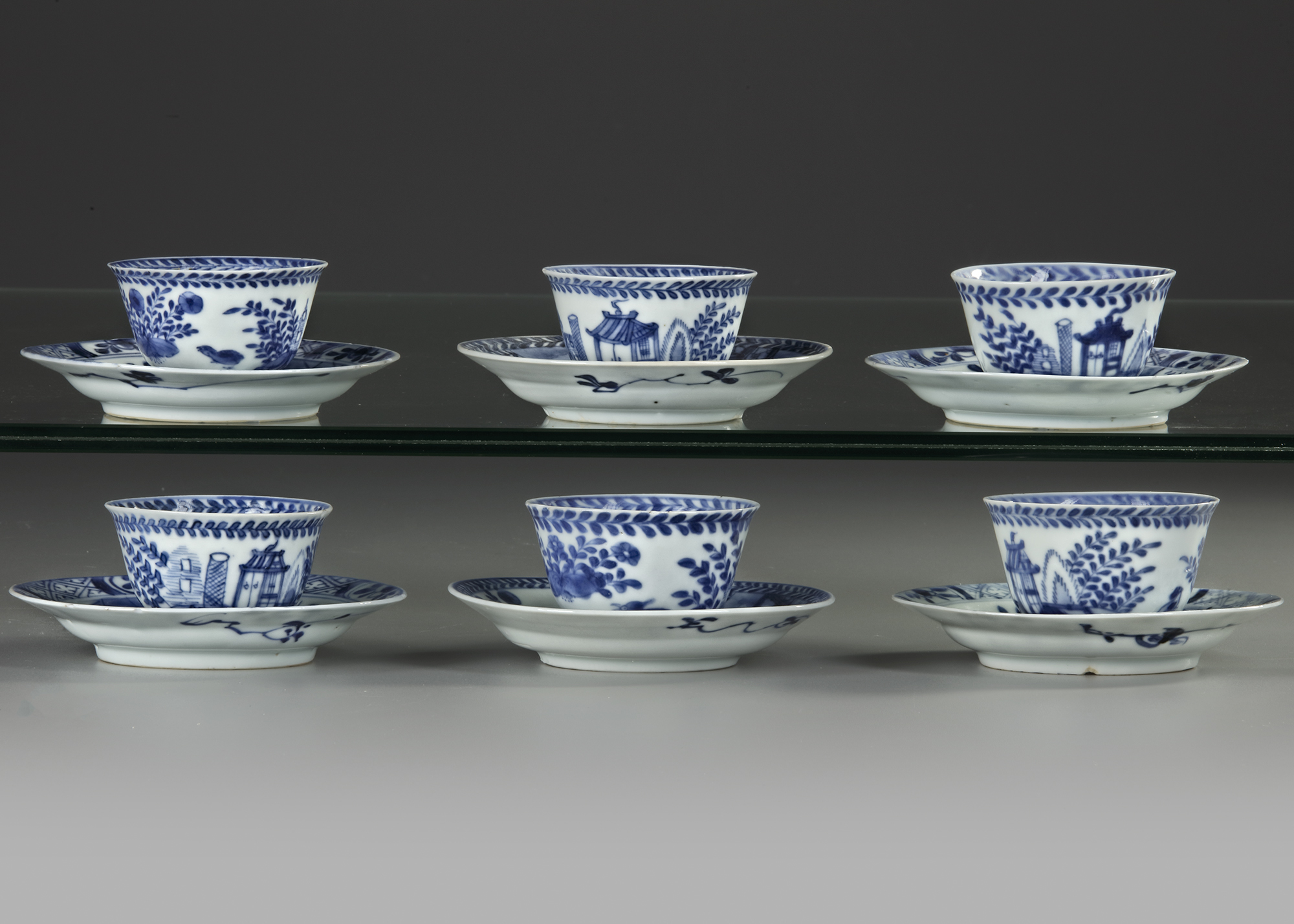 SIX CHINESE BLUE AND WHITE 'CUCKOO IN THE HOUSE' CUPS AND SAUCERS, 18TH CENTURY - Image 2 of 4