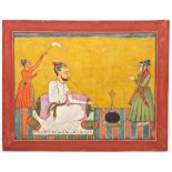 RAJA ANAND DEV OF BAHU SEATED SMOKING A HUQQA, WITH TWO ATTENDANTS, BAHU (JAMMU), CIRCA 18TH CENTURY