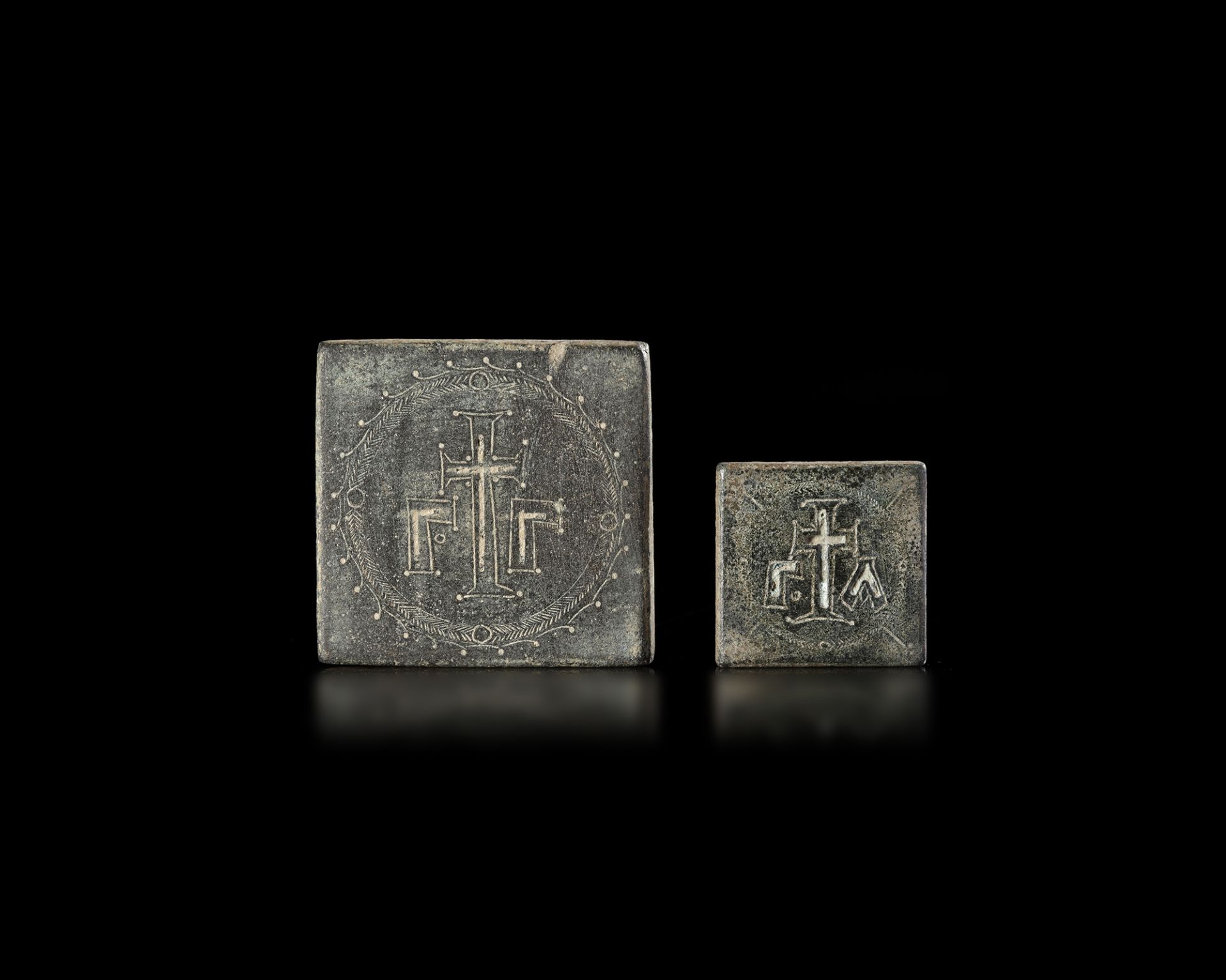 TWO BYZANTINE BRONZE COMMERCIAL WEIGHTS, 5TH-7TH CENTURY AD