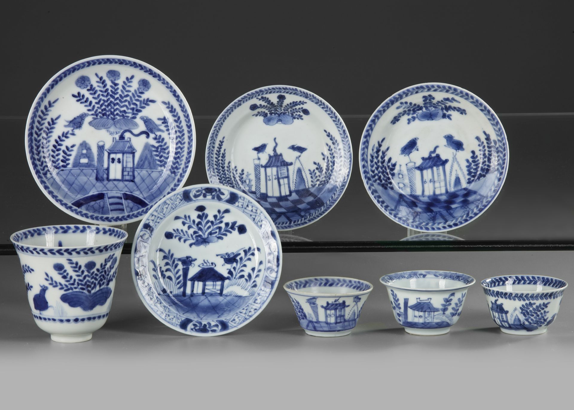 FOUR CHINESE BLUE AND WHITE 'CUCKOO IN THE HOUSE' CUPS AND SAUCERS, 18TH CENTURY - Image 2 of 3