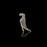 A SILVER STATUETTE OF AN EAGLE/FALCON, 3RD CENTURY BC