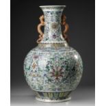 A LARGE CHINESE DOUCAI BOTTLE VASE, 19TH-20TH CENTURY