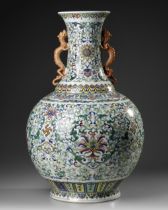 A LARGE CHINESE DOUCAI BOTTLE VASE, 19TH-20TH CENTURY