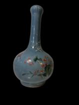 Blue Chinese vase decorated with flowers