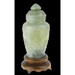 Chinese jade bottle on wooden stand