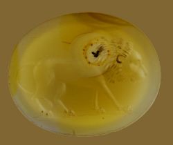 Yellow stone with an engraving of a lion