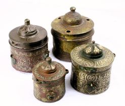 A set of Seljuk, silver and bronze, jars with lids