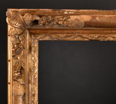 19th Century French School. A Louis Style Carved Giltwood Frame, with swept and pierced centres