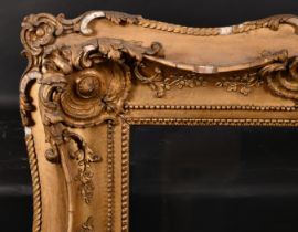 19th Century English School. A Gilt Composition Frame, with swept and pierce centres and corners and