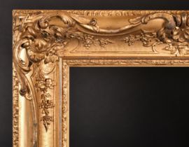 19th Century English School. A Gilt Composition Frame, with swept centres and corners, rebate 25.75"