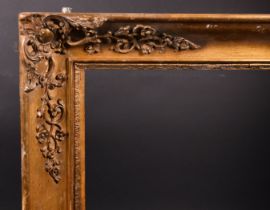19th Century French School. A Gilt Composition Frame, with swept corners, rebate 25.5" x 21.5" (64.8