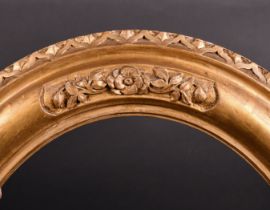 Late 19th Century English School. An Oval Gilt Composition Frame, with Lely panels, rebate 24.25"