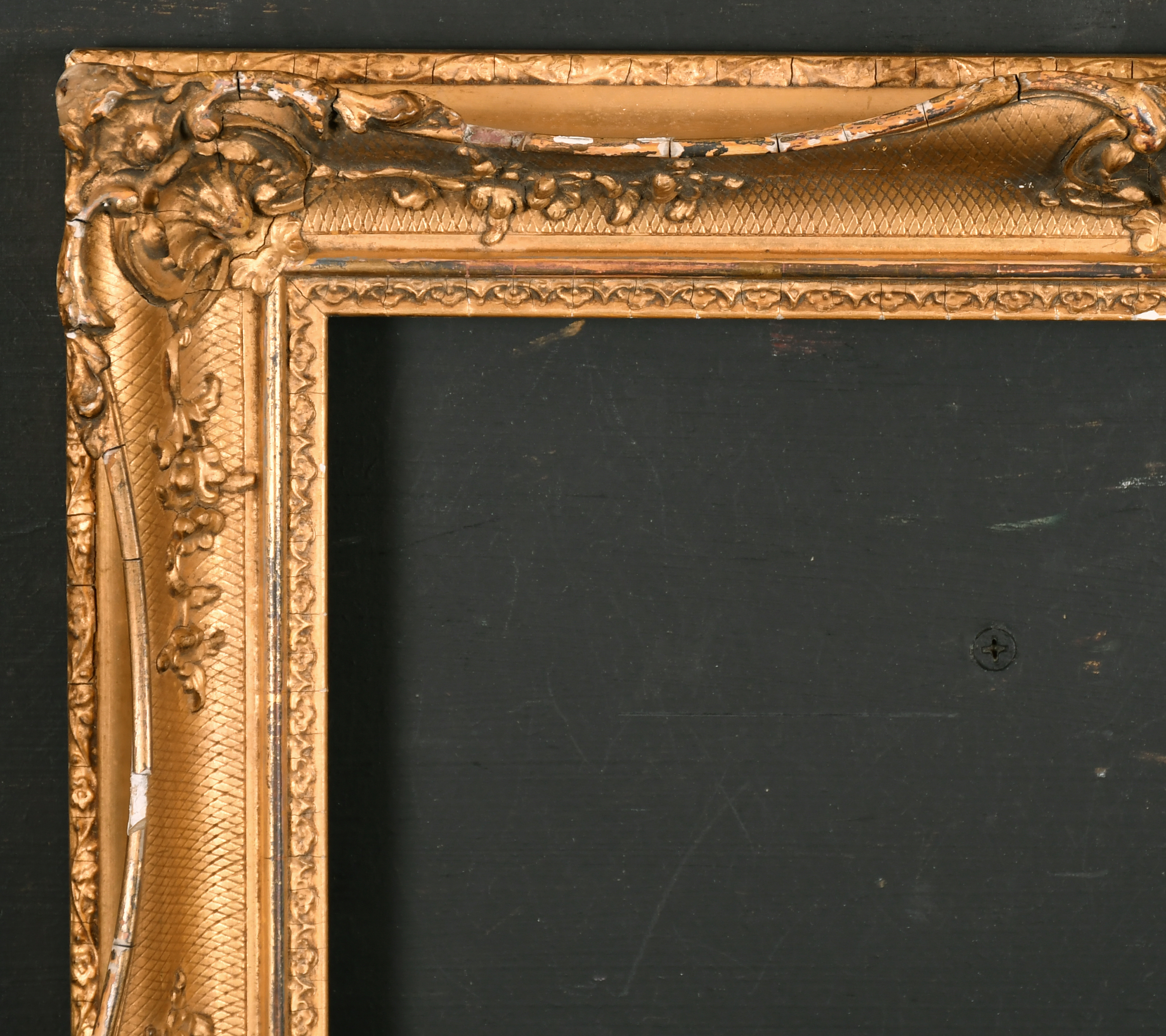 19th Century English School. A Gilt Composition Frame, with swept centres and corners, rebate 14"