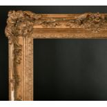 20th Century English School. A Gilt Composition Frame, with swept and pierced centres and corners,