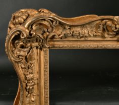 19th Century English School. A Gilt Composition Frame with swept and pierced centres and corners,