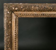 18th Century English School. A Carved Giltwood Frame, rebate 50" x 40" (127 x 101.6cm)