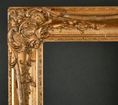 19th Century English School. A Gilt Composition Frame with swept centres and corners, rebate 32.