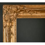 19th Century English School. A Gilt Composition Frame with swept centres and corners, rebate 32.