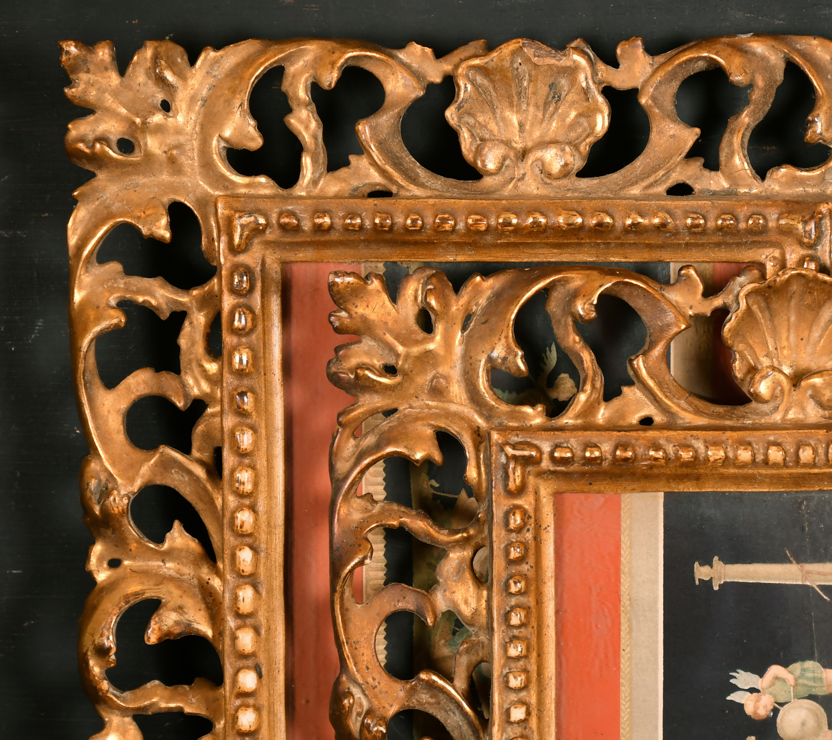 19th Century Italian School. A Pair of Carved Giltwood Florentine Frames, with inset print and