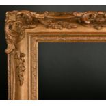 20th Century English School. A Gilt Composition Frame, with swept and pierced centres and corners,