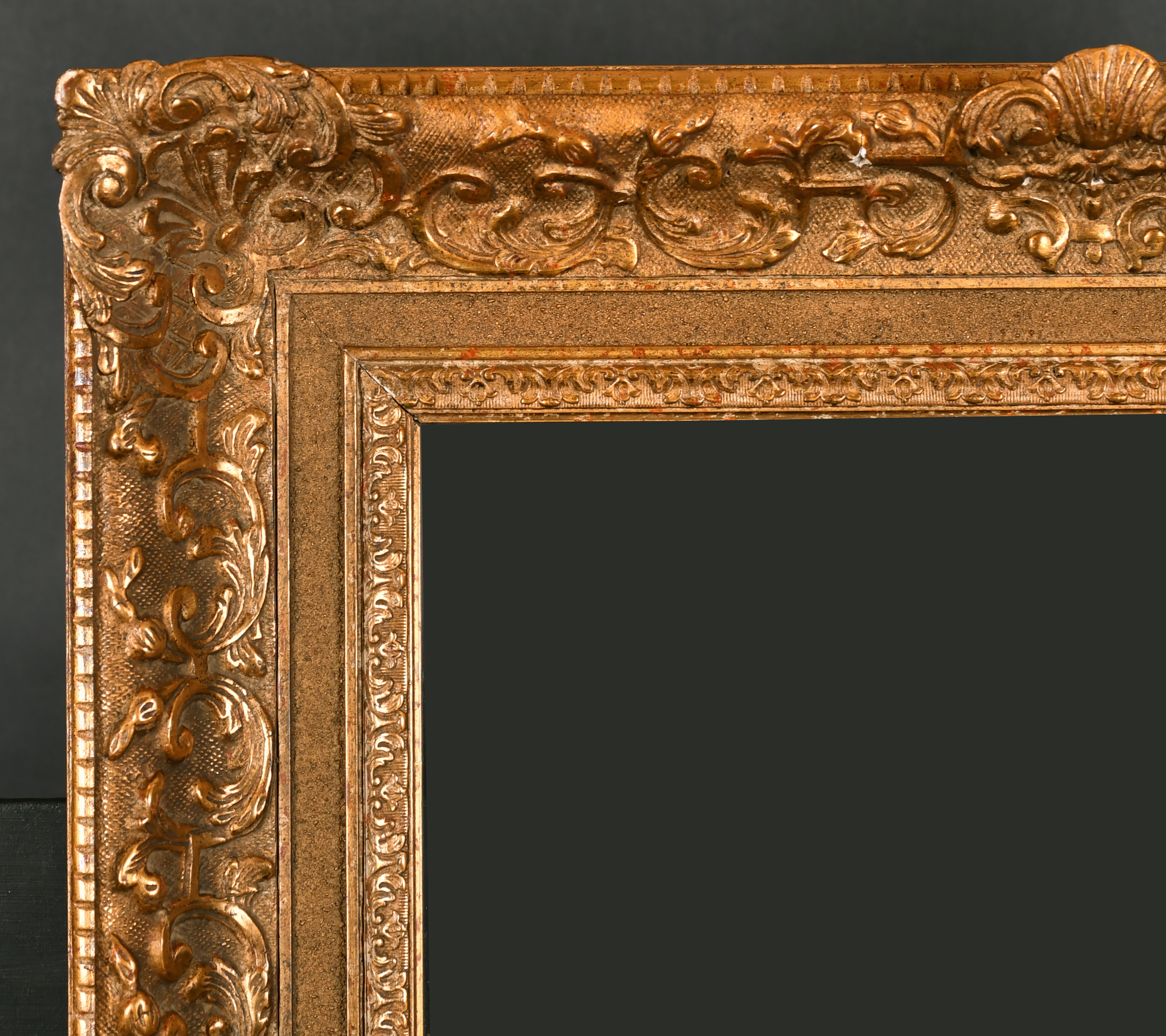 19th Century French School. A Louis Style Gilt Composition Frame, with swept centres and corners and